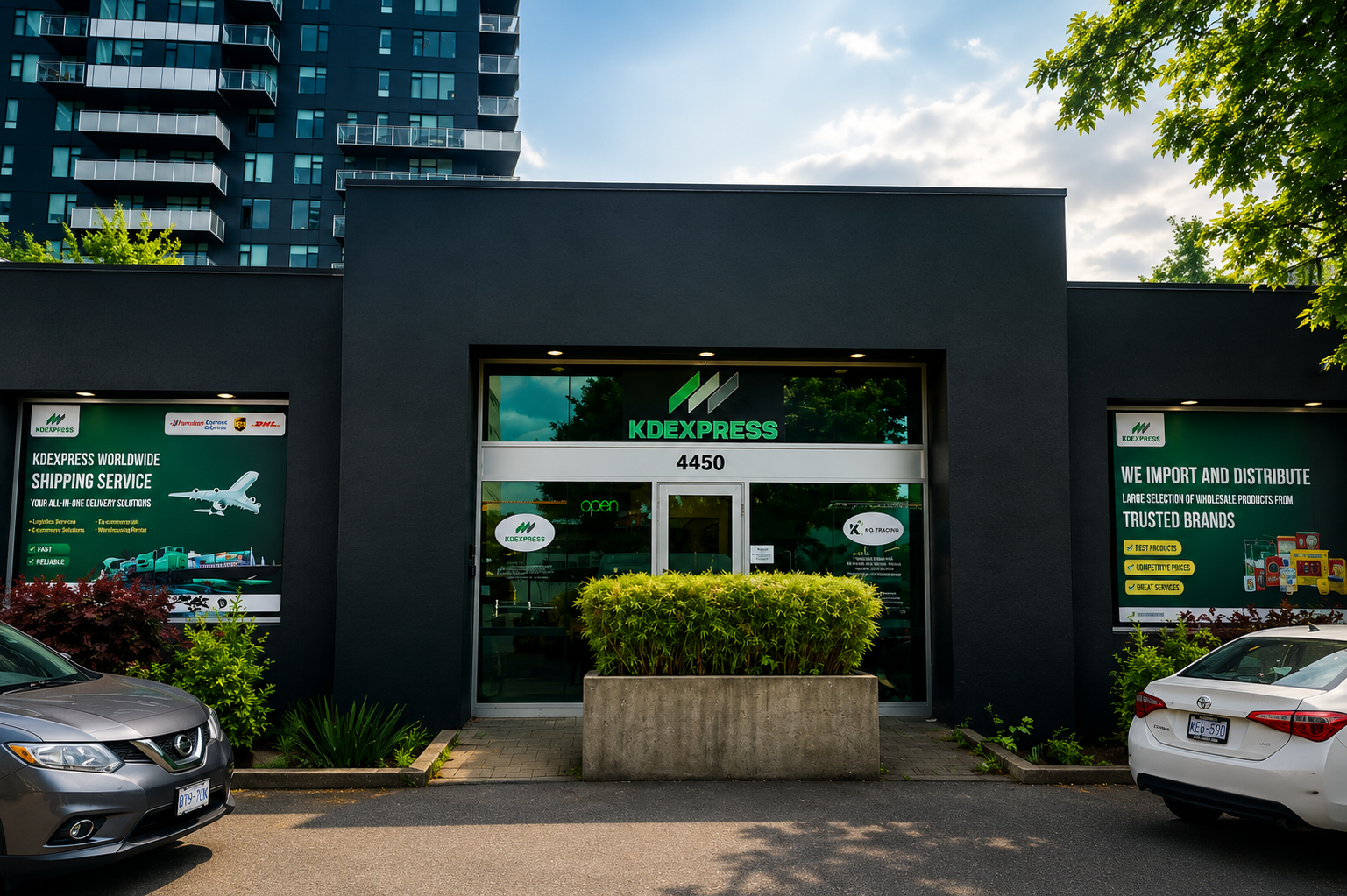 KDEXPRESS Vancouver warehouse exterior at 4450 Juneau St, branded entrance with shipping and import service signage